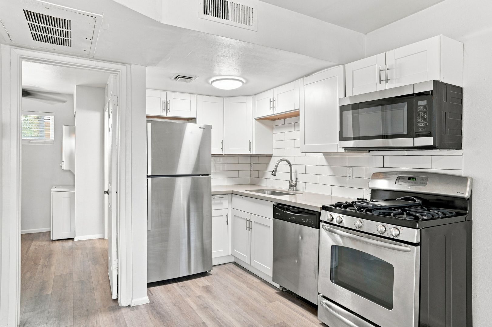 Apartment kitchen — representative home at The Element.