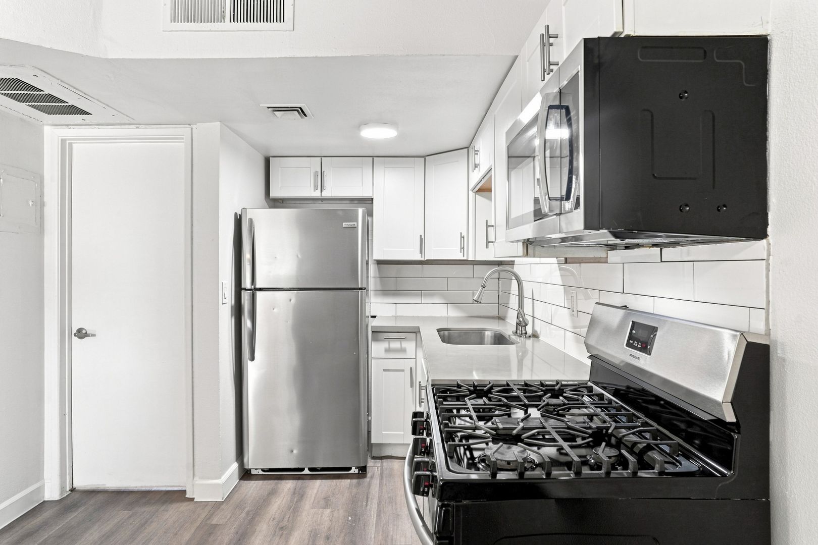Apartment kitchen — representative home at The Element.