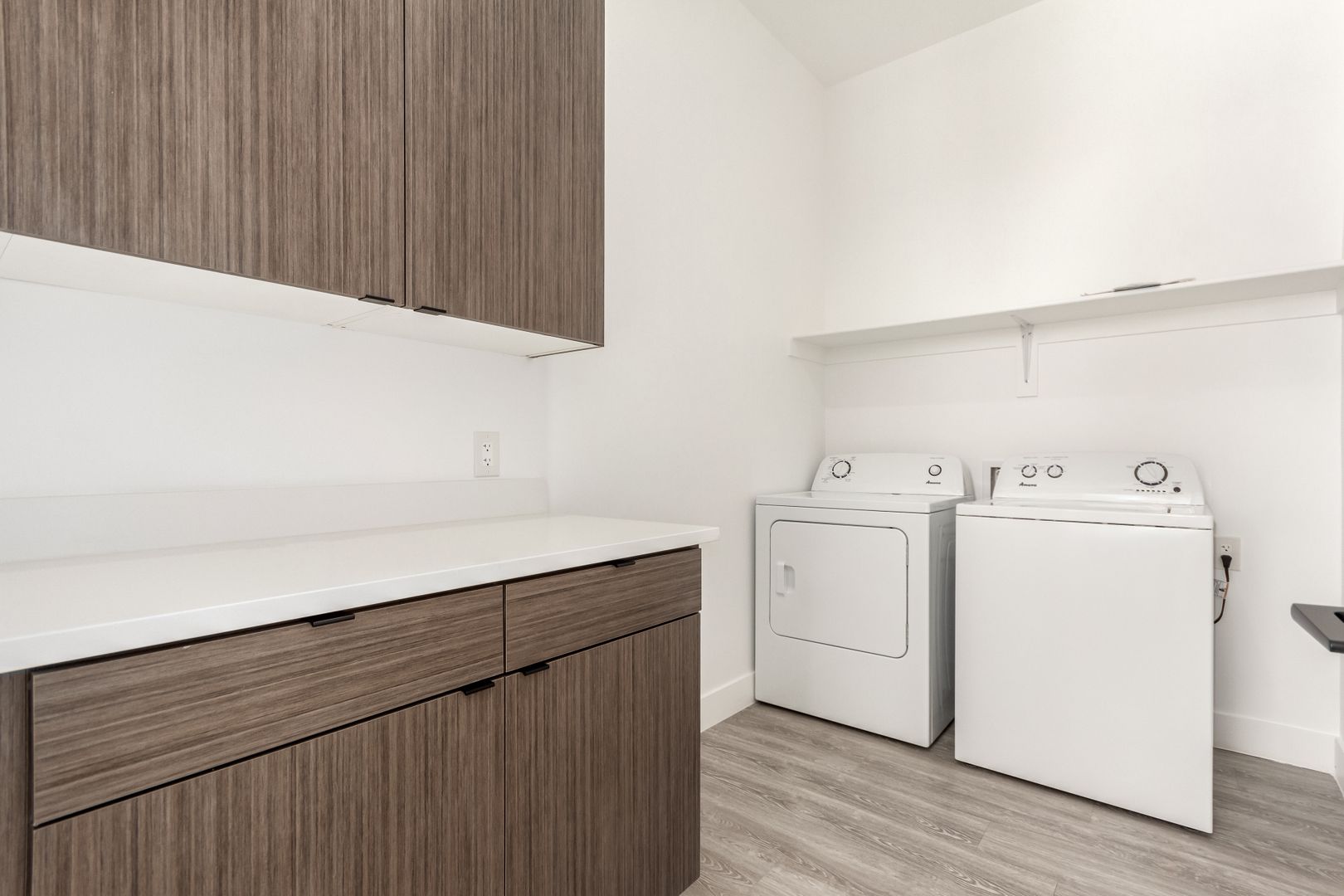 In-home laundry area — representative home at Arcadia 15.