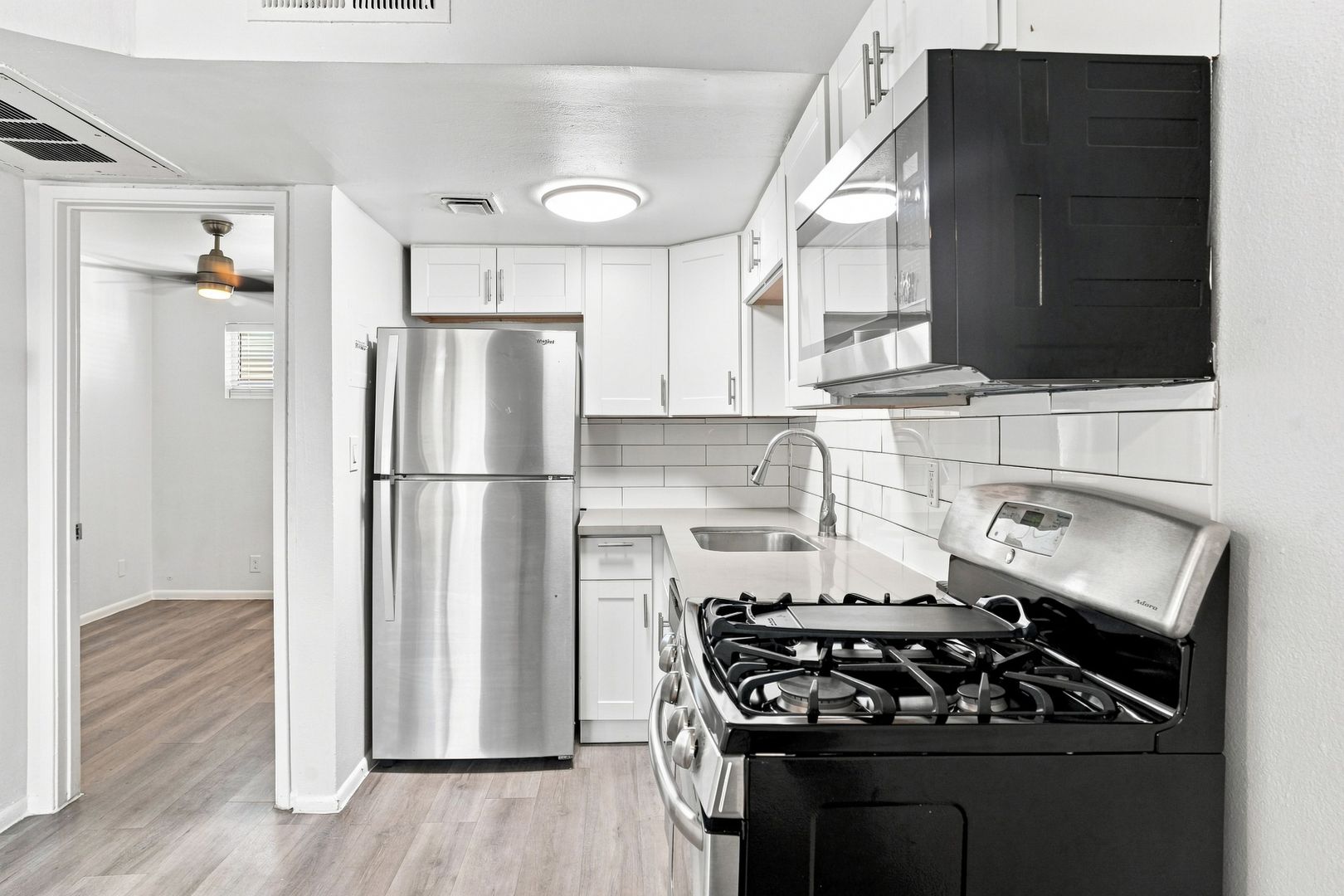 Apartment kitchen — representative home at The Element.