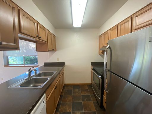 Last Available - 2nd Floor South Facing - Spacious Corner 2 Bedroom x 2 Bathroom Apartment - Includes A Garage Parking Space! – photo 1
