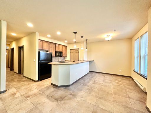 1st Floor with 10' Ceilings! Walk-able to Downtown Bothell! Only one block to the Burke Gilman Trail! – photo 1