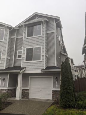 Beautiful End Unit Townhome with Open Floor Plan & 2-Car Garage – photo 1