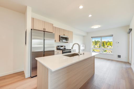 Top Floor 1 Bed with Den with water views, AC and 12 Months Free Parking! – photo 1
