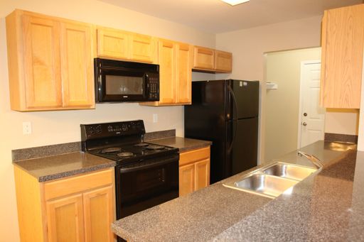 Beautiful 3/2 Duplex Home ~ Open Kitchen/Living Room Area with Fenced Backyard ~ Located Near Historic Camp Bowie ~ Attached 1 Car Garage ((Coming Soon!)) – photo 1