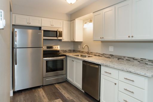 Half Off First Full Months Rent!! 2BD/1BTH + W/D In Unit + Covered Assigned Parking – photo 1