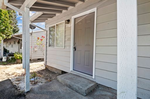 Renovated Ground Floor Corner 1-Bed with Private Fenced Yard + W/D Hookups + Large Pets Welcome!!