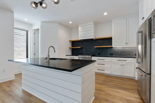 UT PRE-LEASE: Remodeled 3 BR / 2.5 BA with Designer Finishes - Walk to UT - 4 Off-Street Parking – photo 1