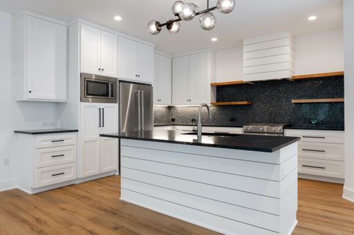 UT PRE-LEASE: Remodeled 3 BR / 2.5 BA with Designer Finishes - Walk to UT - 4 Off-Street Parking – photo 1