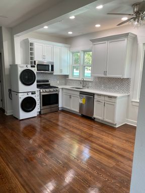 UT PRE-LEASE: 4 bed / 2 bath FULL REMODEL! West Campus fourplex unit. Walk to UT, entertainment, restaurants, and more. – photo 1