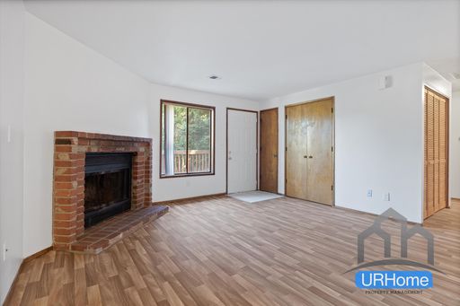 Inviting 2-Bed Retreat | Fireplace, Garage & In-Unit Laundry – photo 1