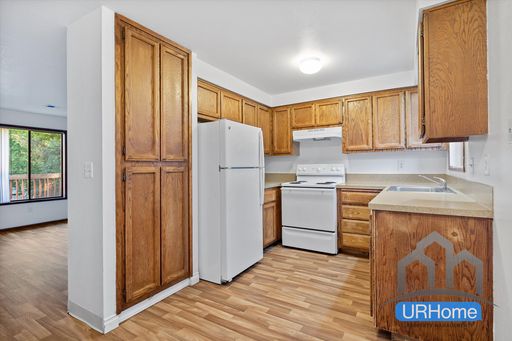 Bright 2-Bedroom Haven | Fireplace, Private Garage & In-Unit Laundry – photo 1