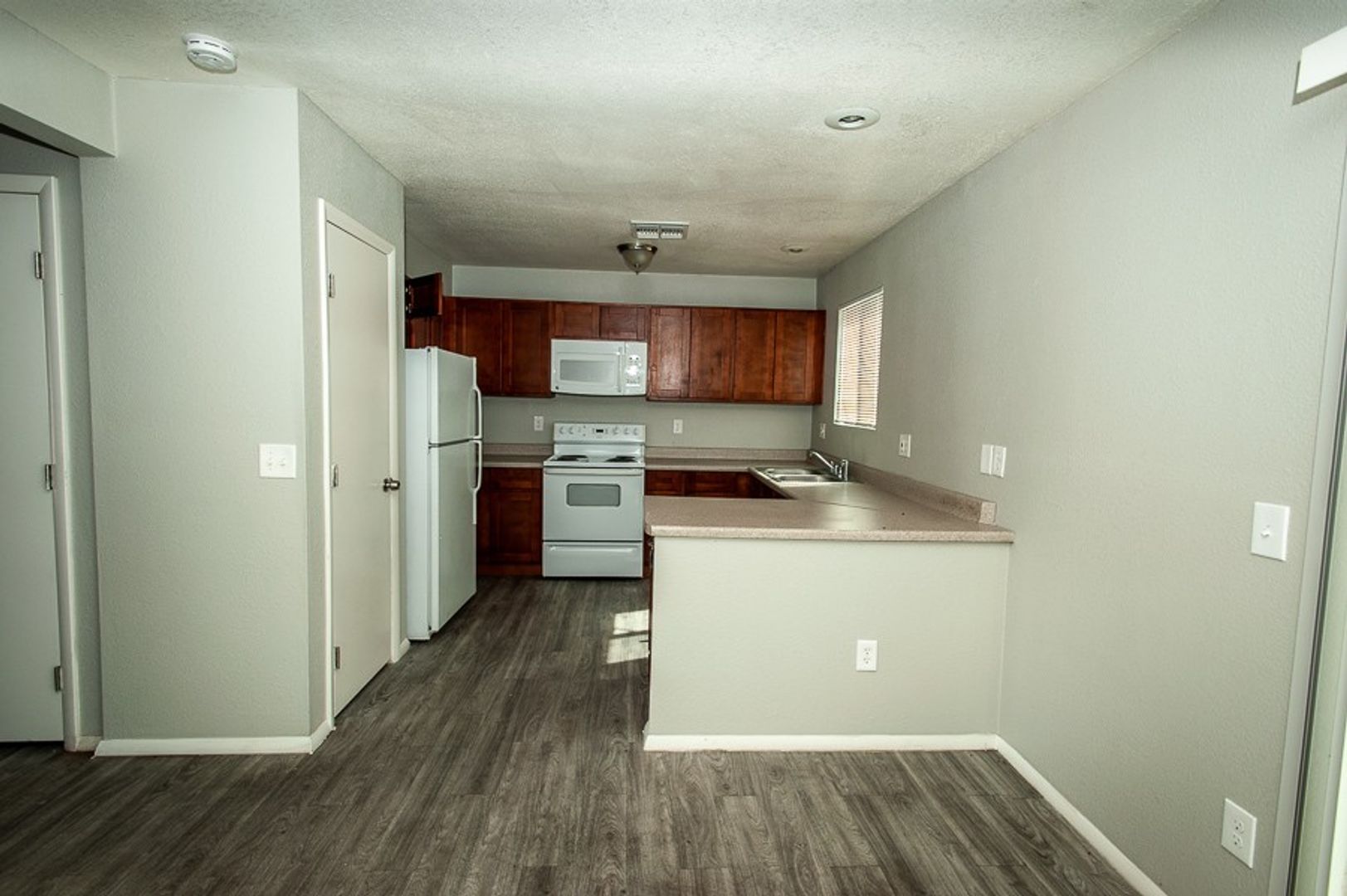 Apartment kitchen — representative home at 35th Avenue Townhouse.