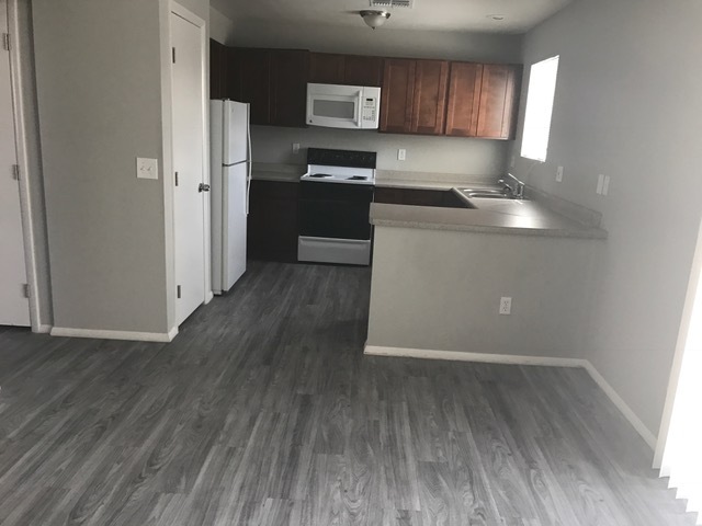 Apartment kitchen — representative home at 35th Avenue Townhouse.