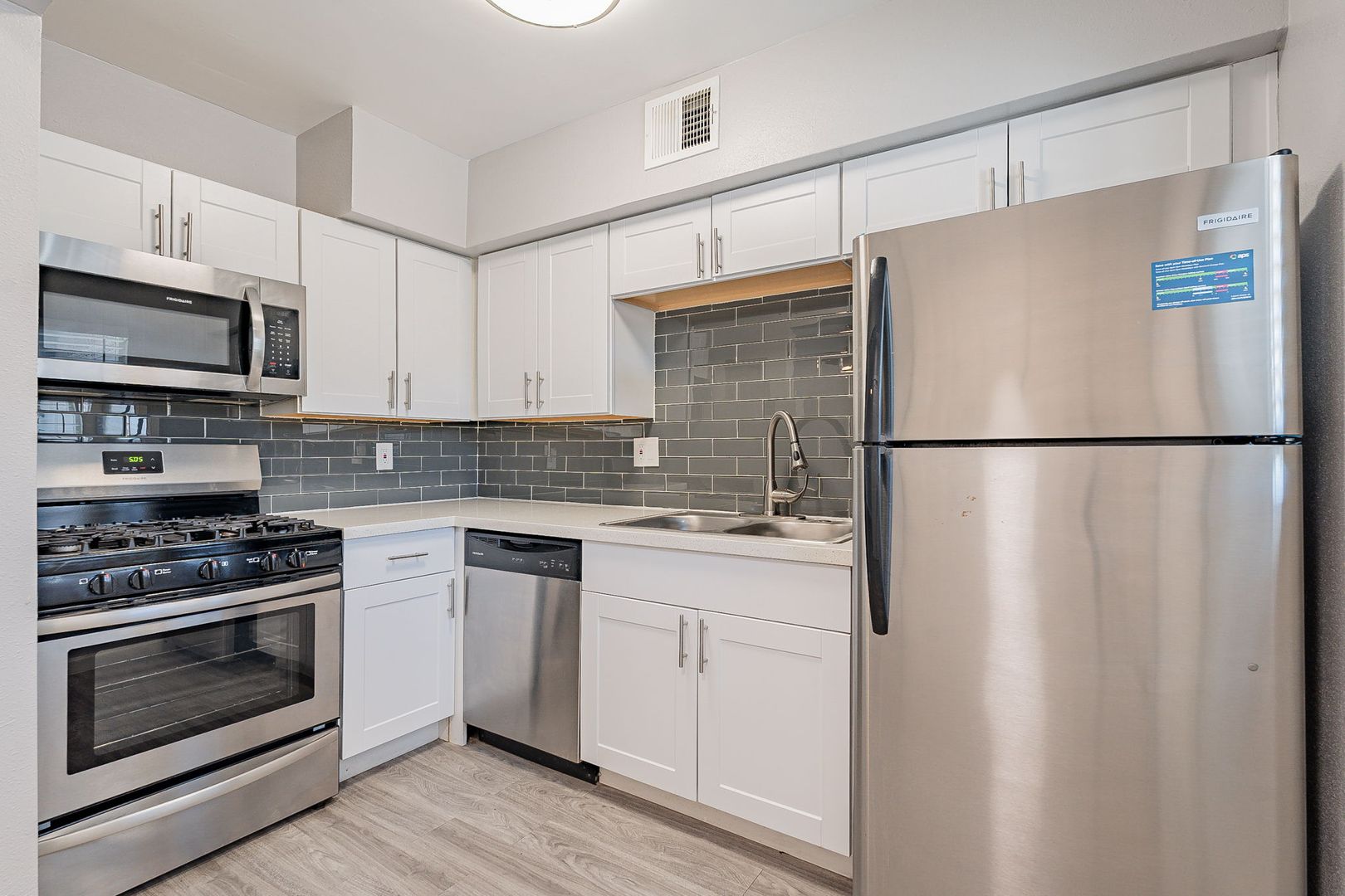Apartment kitchen at 301 Courtyard Living.