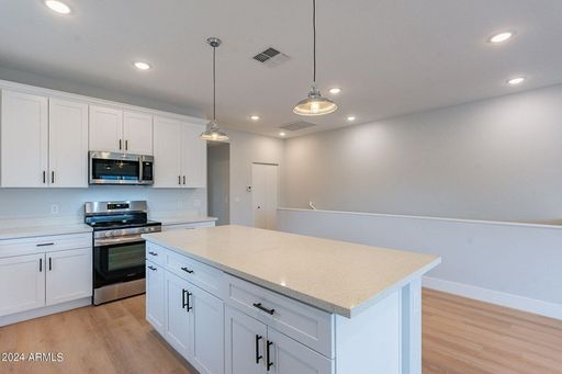 Apartment kitchen — representative home at Halcyon on 18th Street.
