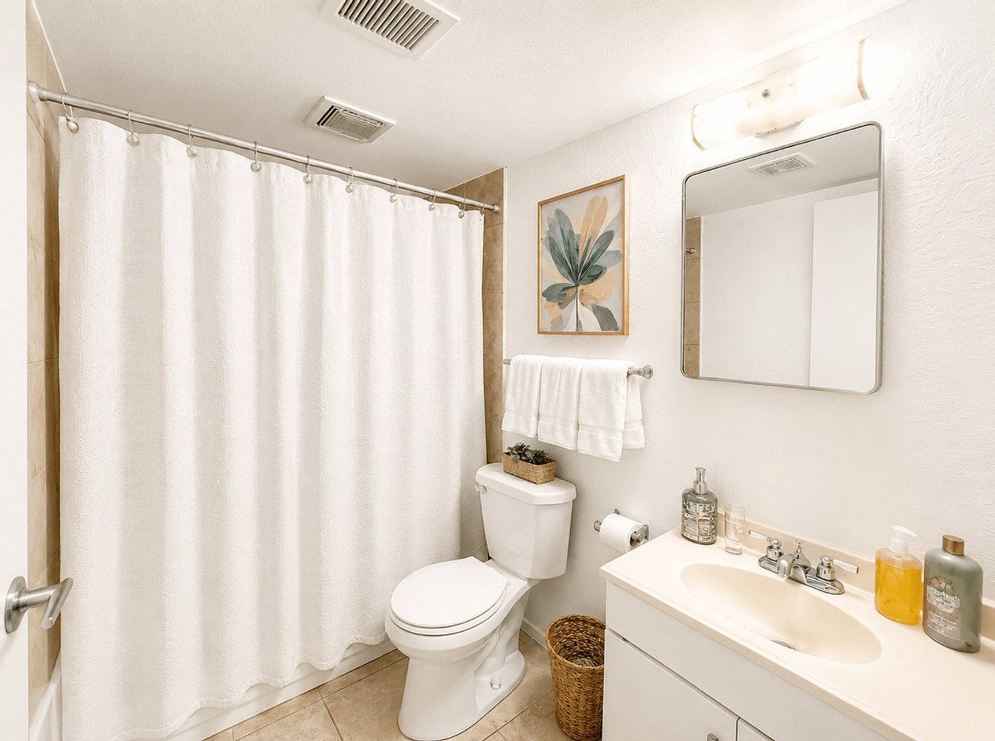 Apartment bathroom — representative home at 12 Palms Apartments.