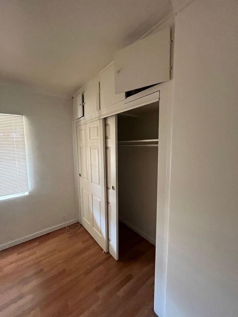 Unfurnished bedroom at San Juan Apartments.