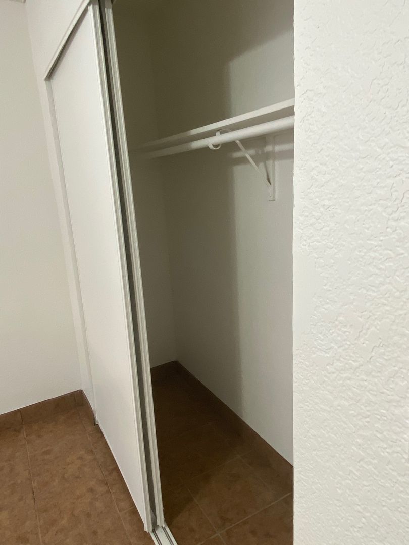 Closet storage — representative home at 10015 North 9th Avenue.