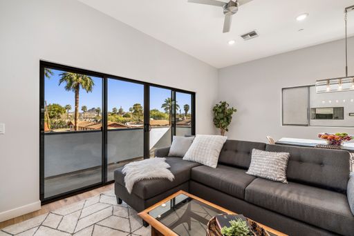 Furnished apartment living area shown — representative home at Halcyon on Cheery Lynn.