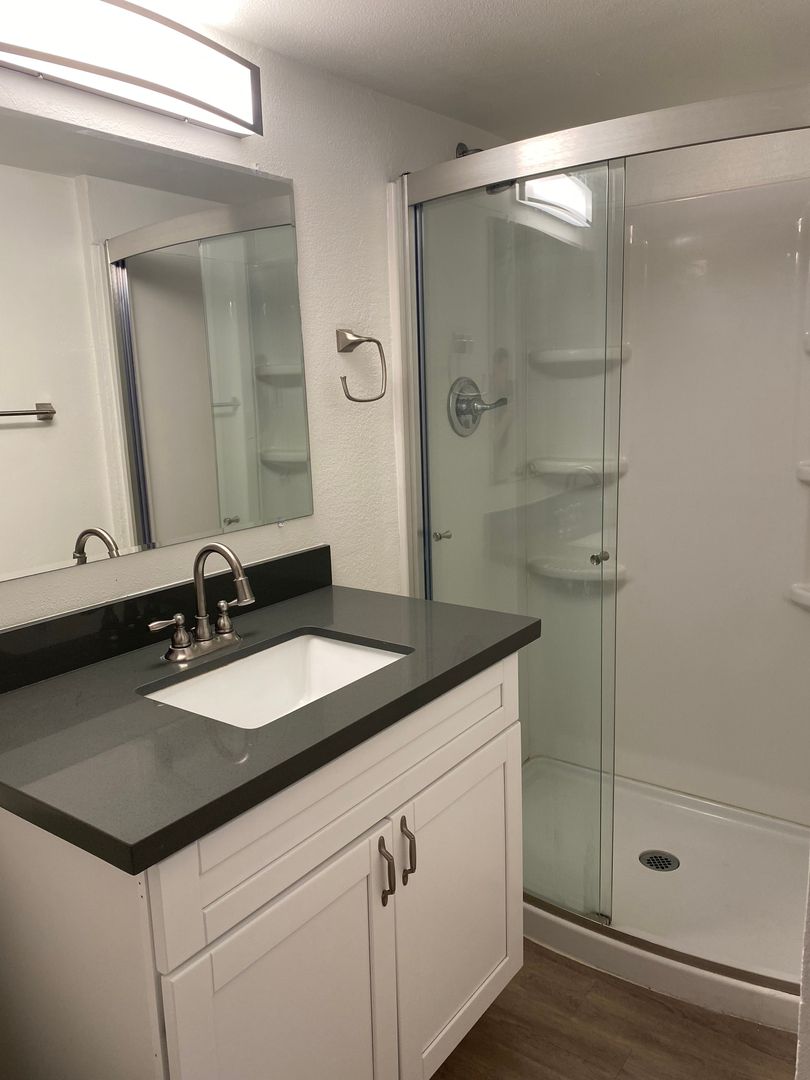 Representative apartment bathroom at Edge Apartments.