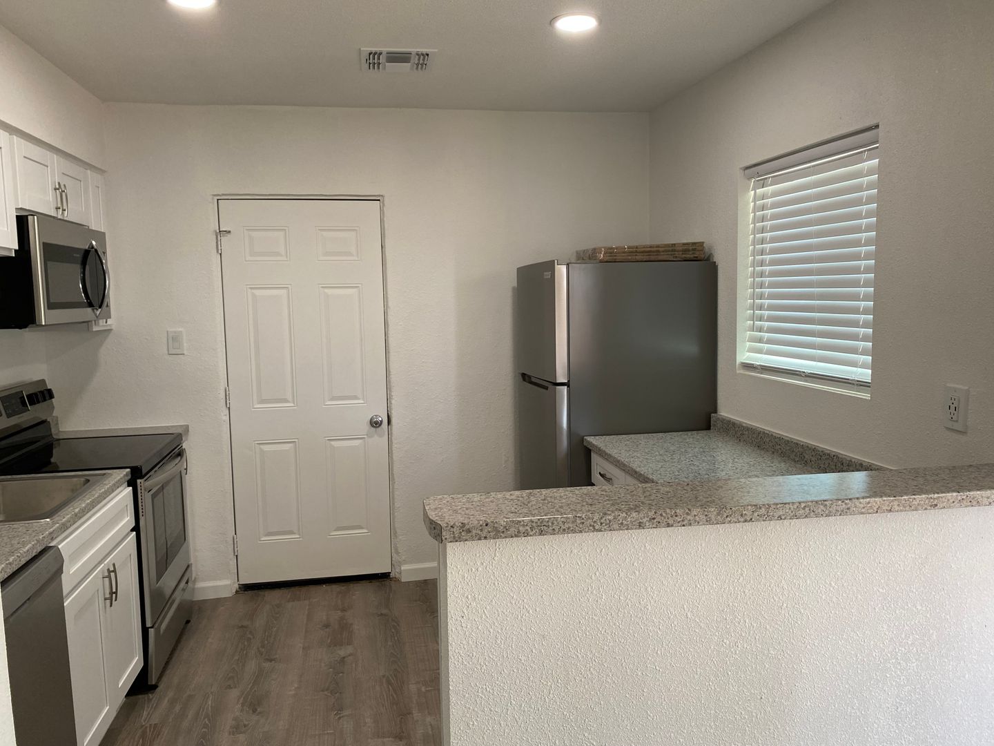 Representative apartment kitchen at Turney Cottages.