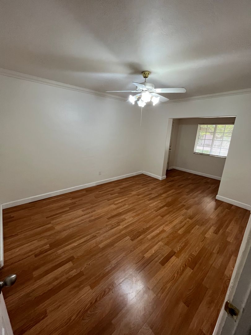 Unfurnished bedroom at San Juan Apartments.