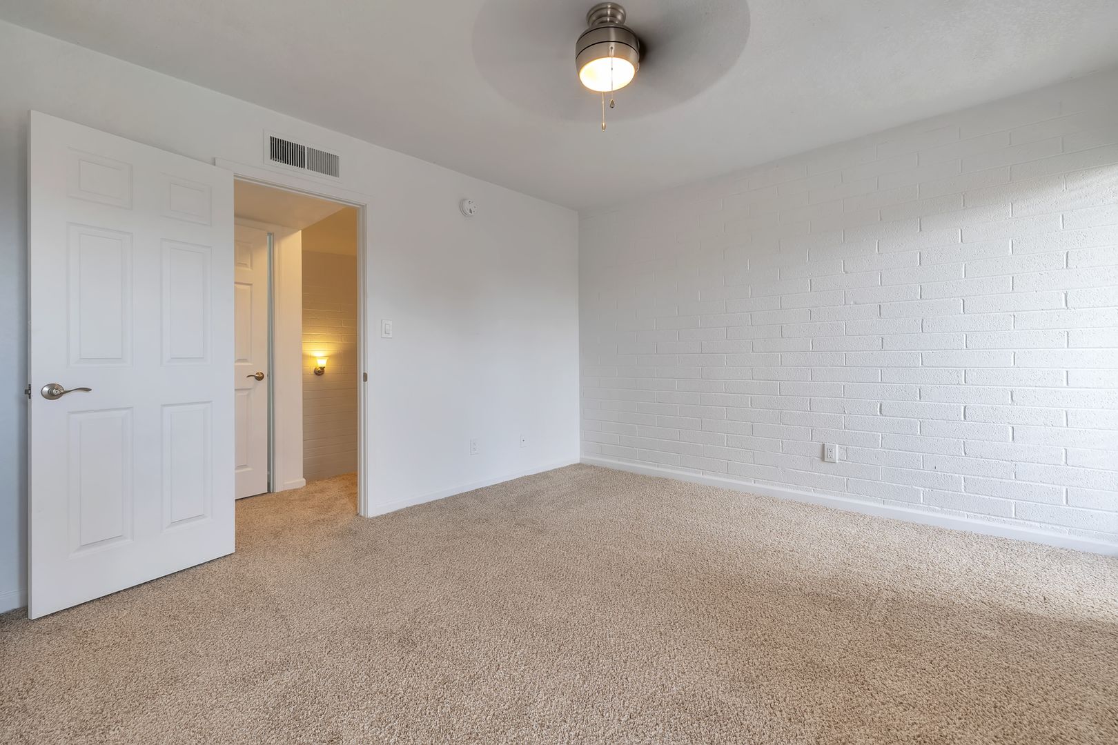Representative unfurnished bedroom at The Spot.