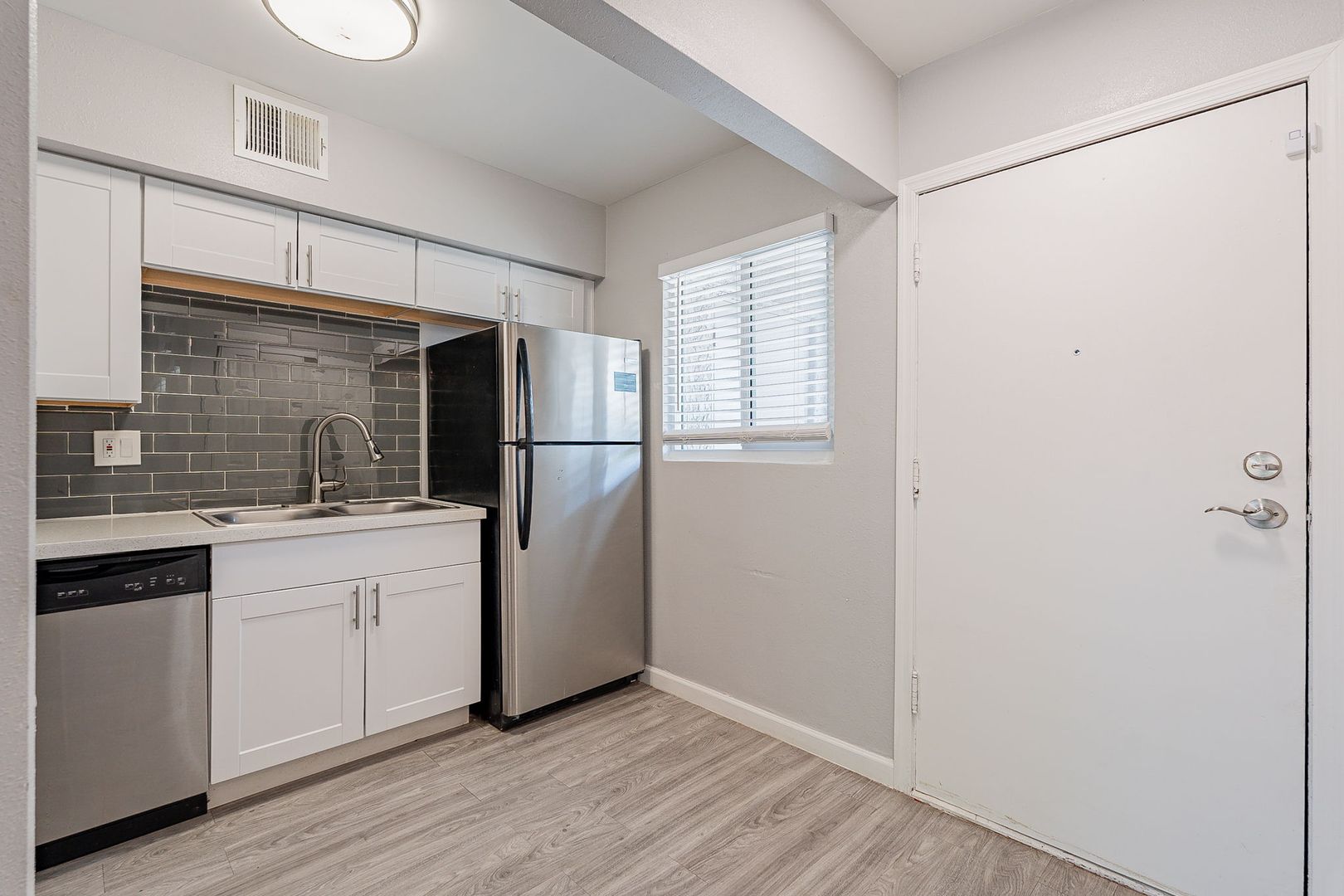 Apartment kitchen at 301 Courtyard Living.