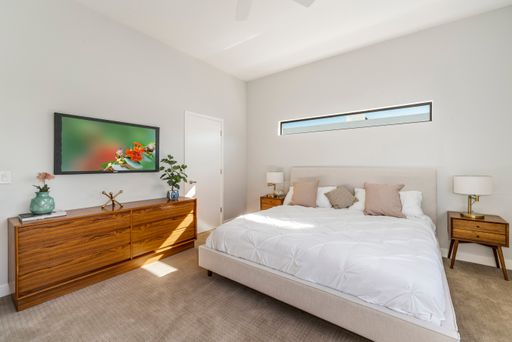 Furnished bedroom shown — representative home at Halcyon on Cheery Lynn.