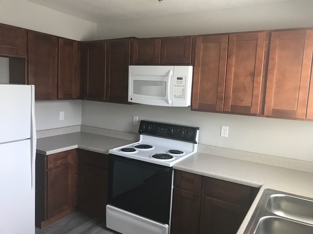 Apartment kitchen — representative home at 35th Avenue Townhouse.