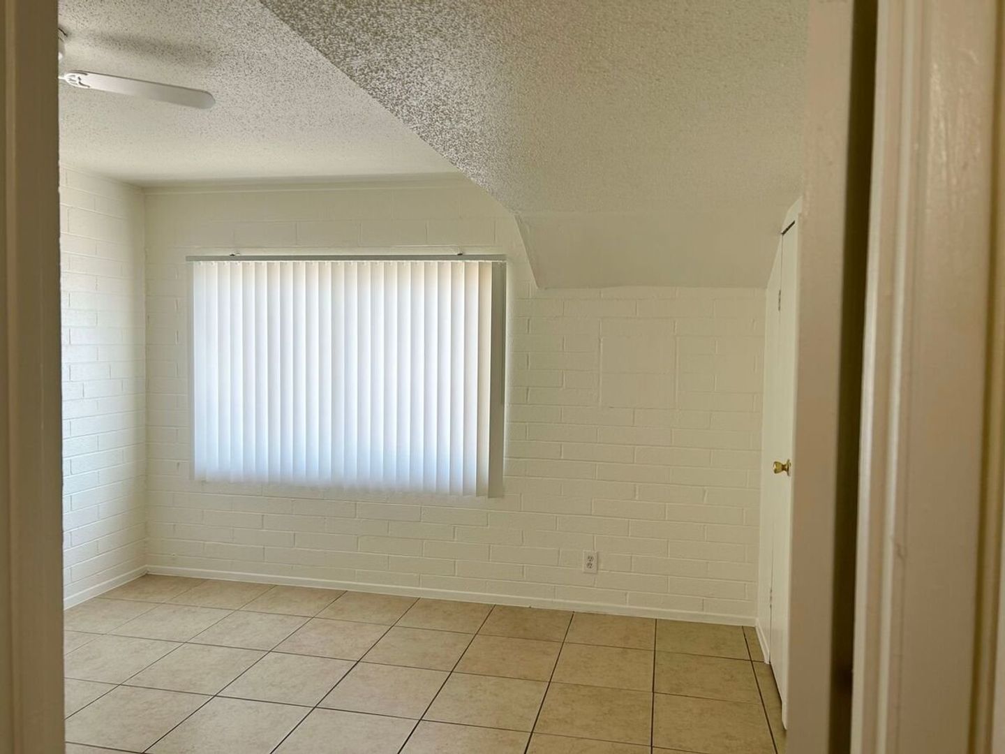 Unfurnished bedroom — representative home at 12 Palms Apartments.