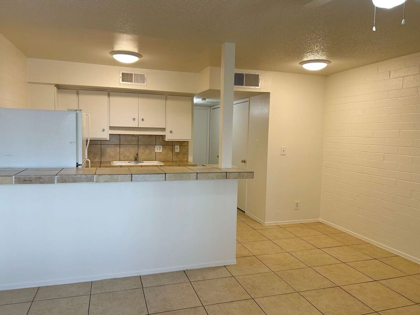Unfurnished apartment interior — representative home at 12 Palms Apartments.