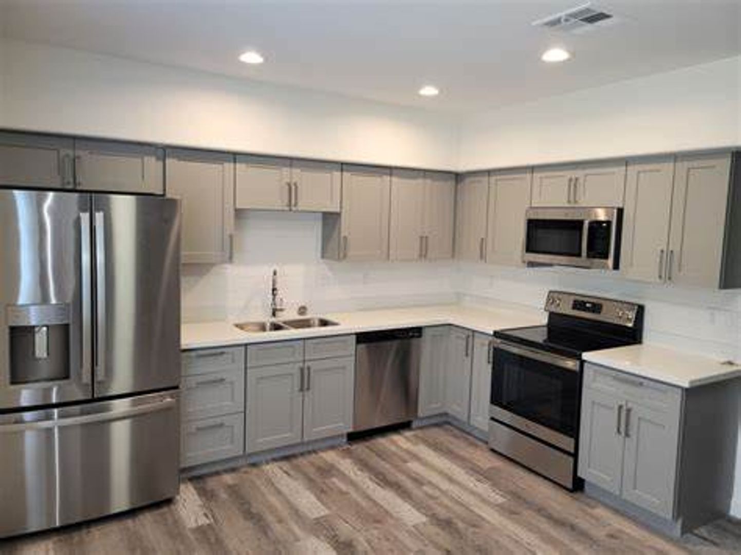 Apartment kitchen — representative home at La Vie.