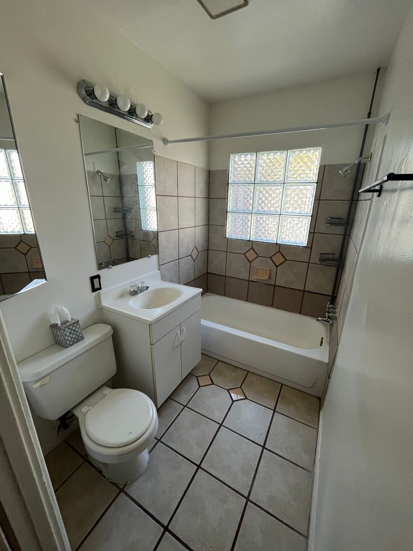 Apartment bathroom at San Juan Apartments.