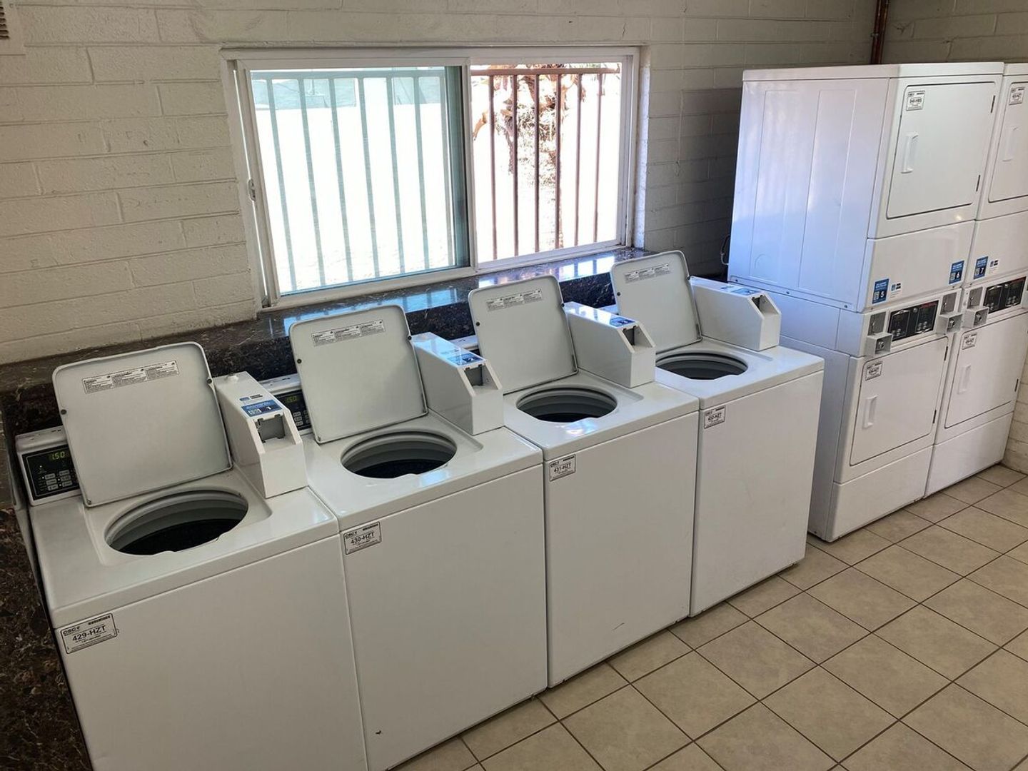 Shared laundry room at 12 Palms Apartments.