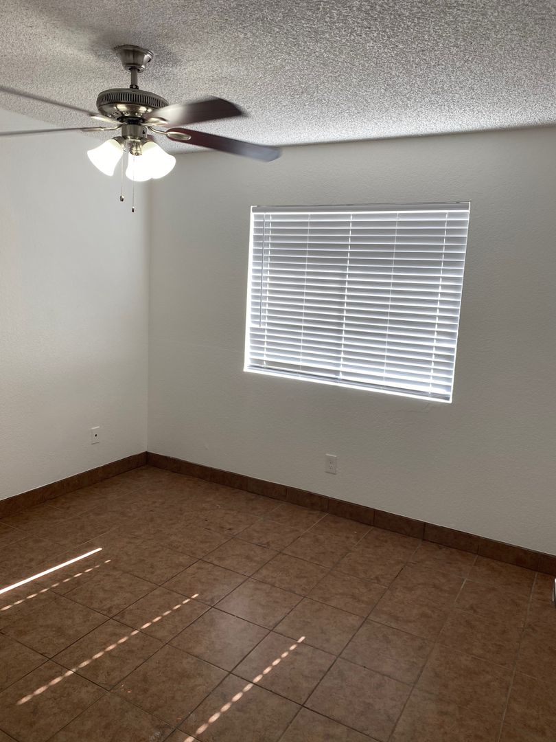 Unfurnished bedroom — representative home at 10015 North 9th Avenue.