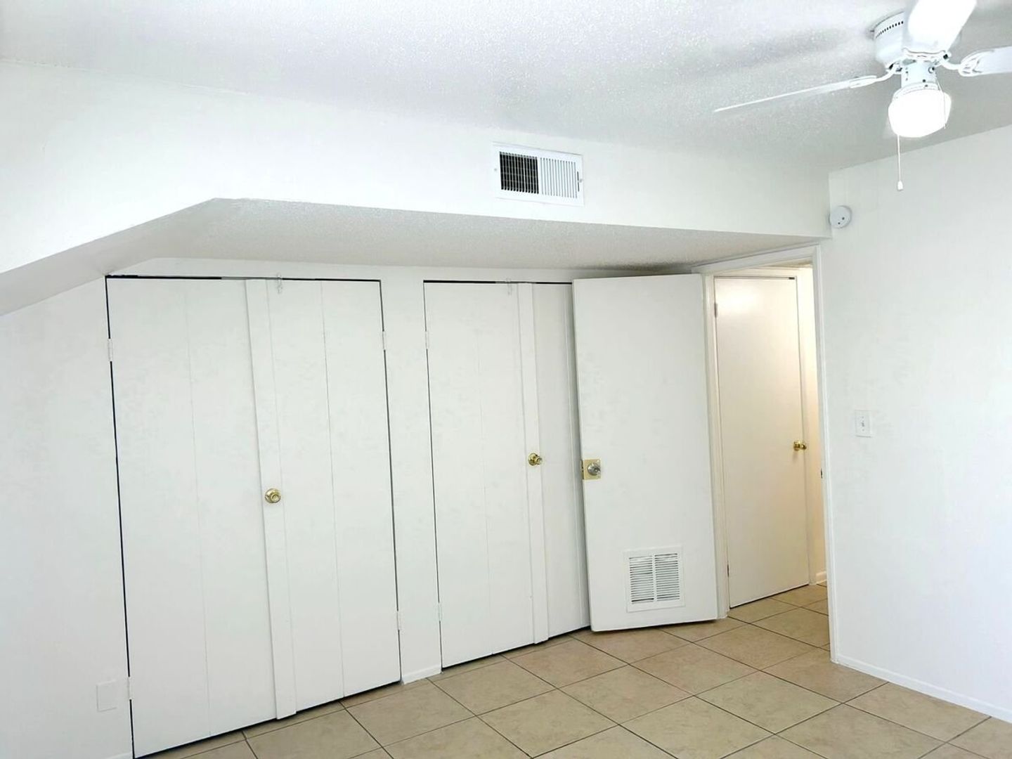 Unfurnished bedroom — representative home at 12 Palms Apartments.