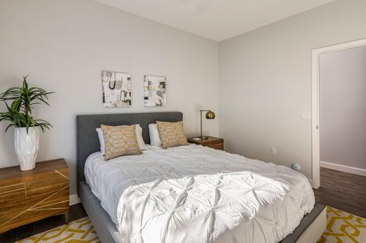 Furnished bedroom shown — representative home at Halcyon on Cheery Lynn.