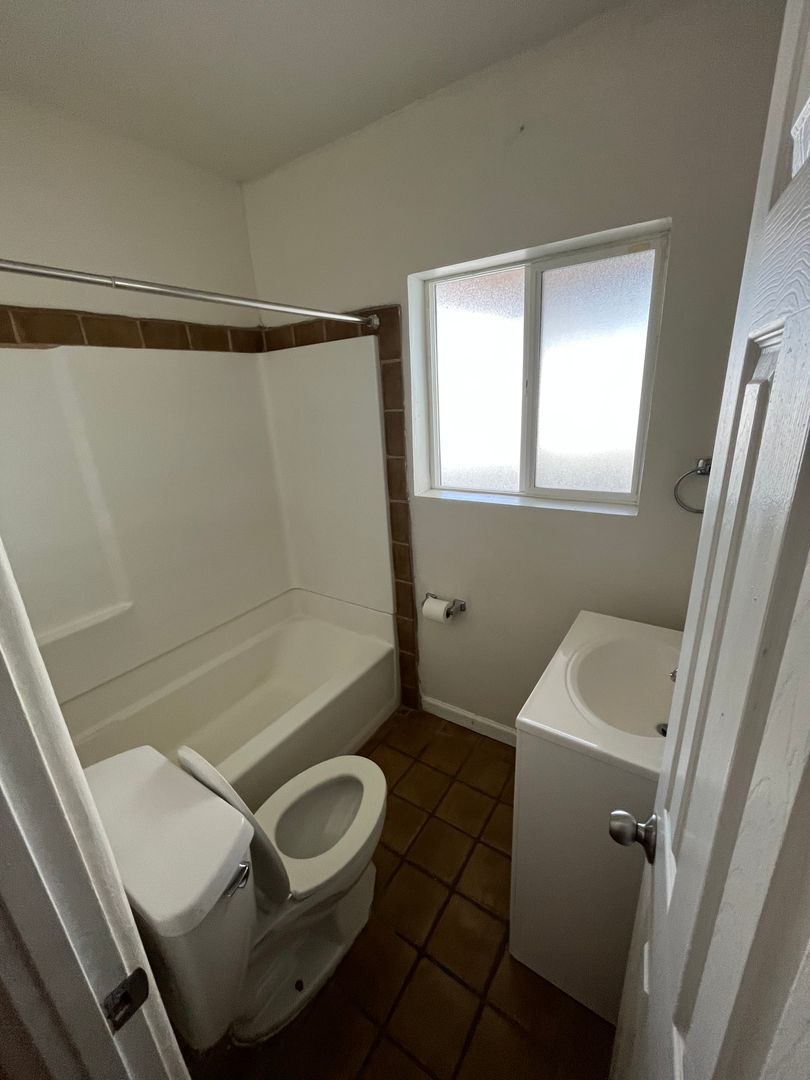 Apartment bathroom at San Juan Apartments.