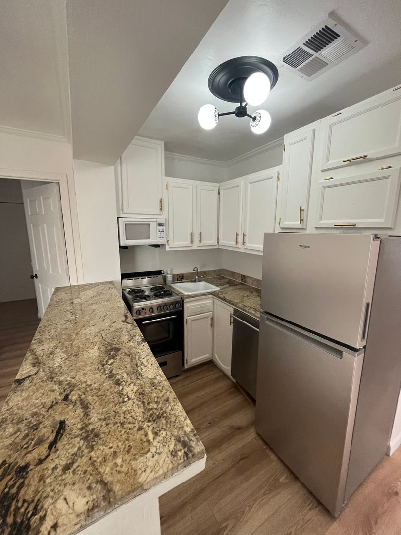 Apartment kitchen at San Juan Apartments.