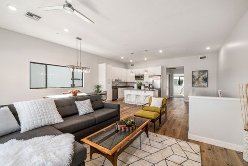 Furnished apartment living area shown — representative home at Halcyon on Cheery Lynn.