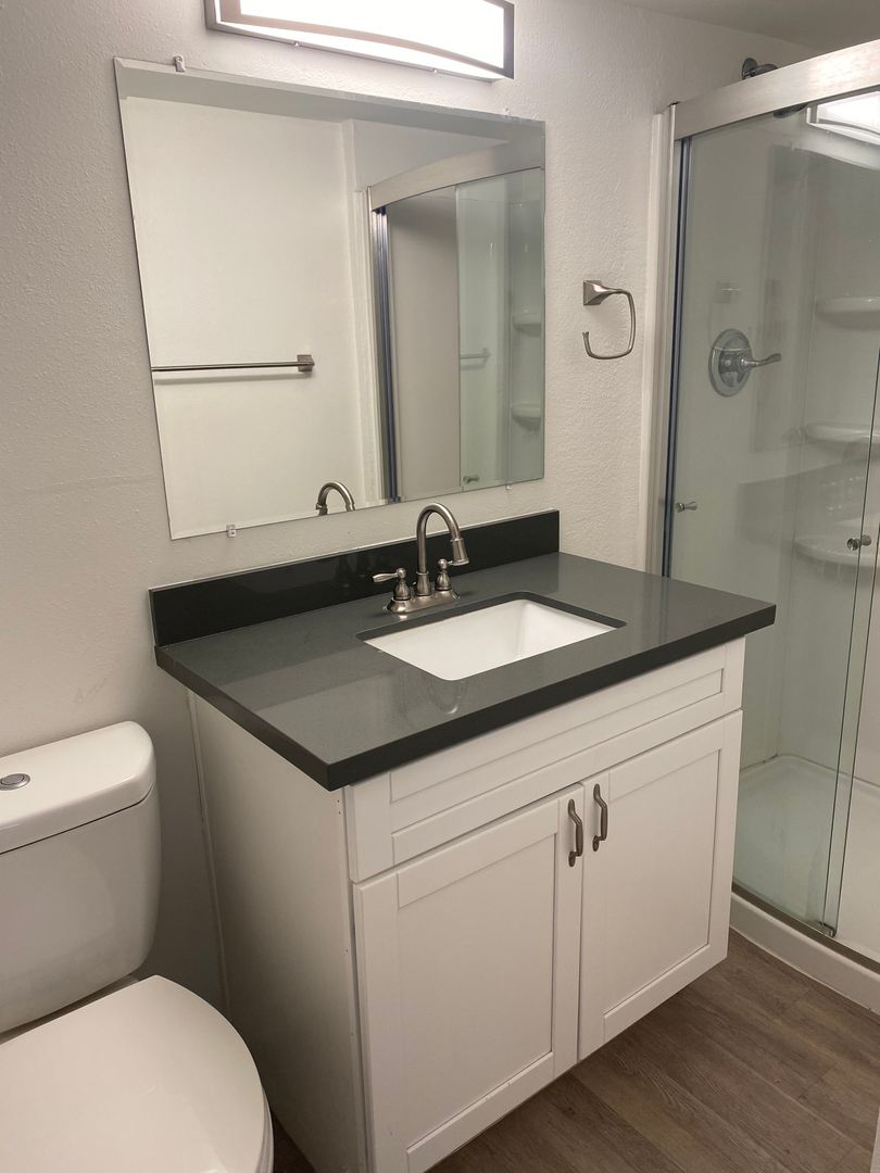 Representative apartment bathroom at Edge Apartments.