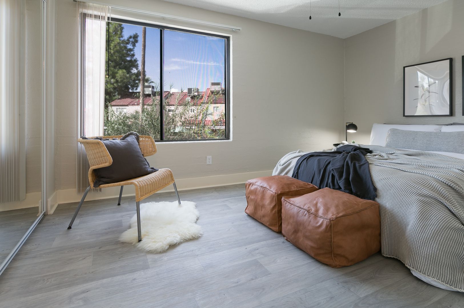 Furnished bedroom shown — representative home at The Marlowe.