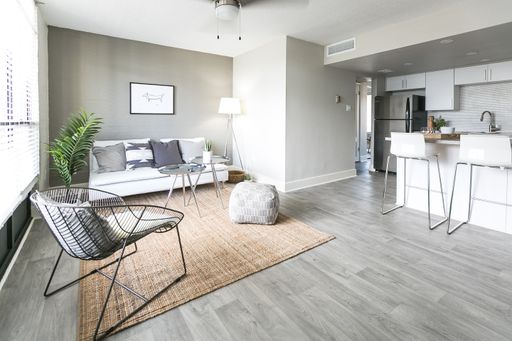 Furnished apartment living area shown — representative home at The Marlowe.