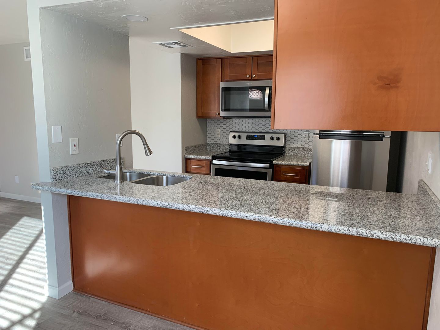 Apartment kitchen — representative home at La Vie.