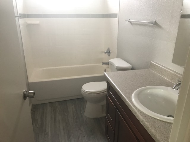 Apartment bathroom — representative home at 35th Avenue Townhouse.
