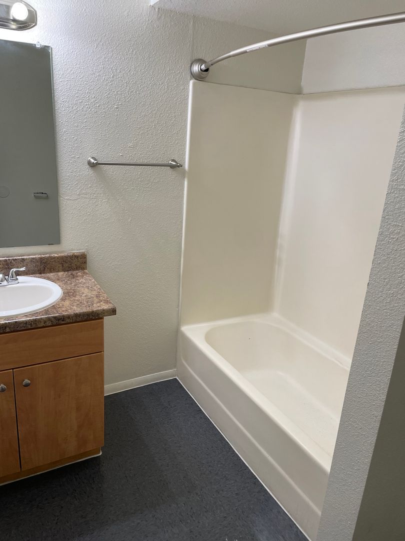 Representative apartment bathroom at Starlight Apartments.