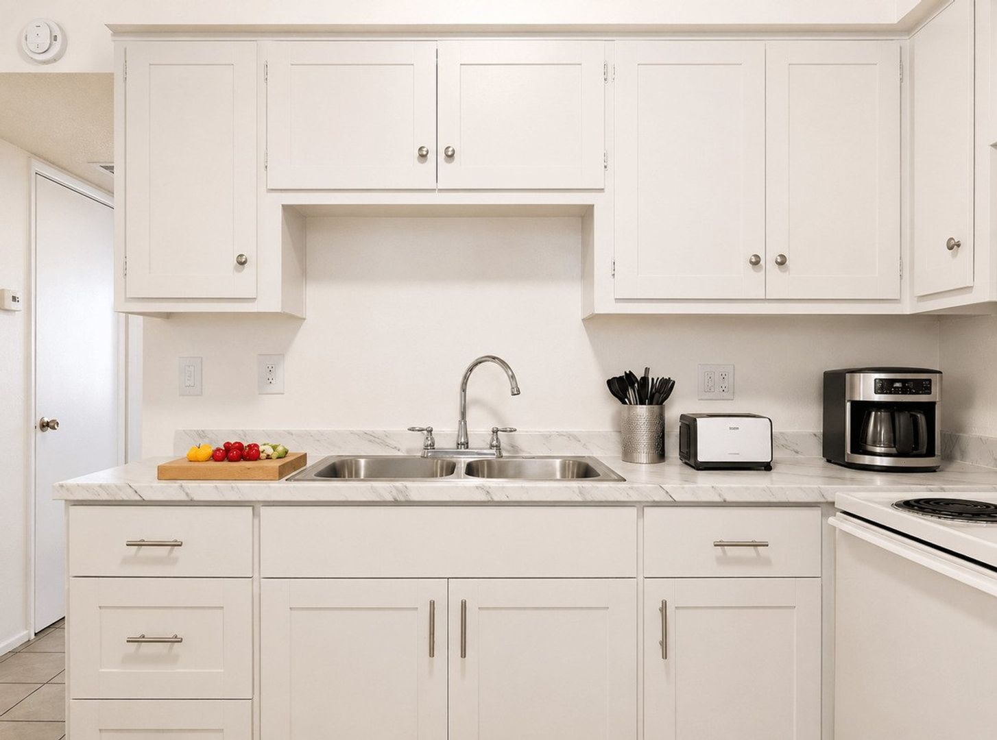 Apartment kitchen — representative home at 12 Palms Apartments.