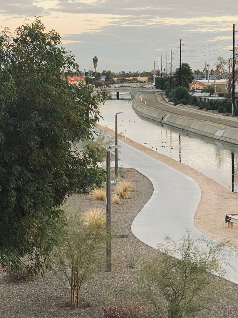 Canal-side surroundings at H2O Apartments.